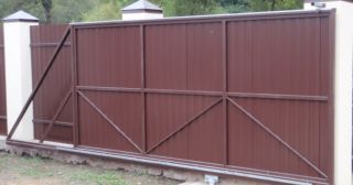 Купить откатные ворота из профнастила Лангепас, цена от 1797 руб.
