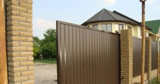 Купить откатные ворота из профнастила Лангепас, цена от 1797 руб.